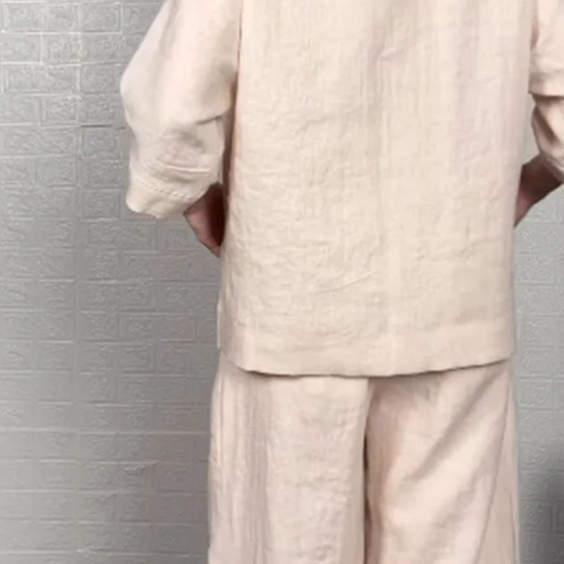 💎 2-teiliges Set aus Baumwoll-Leinen mit unregelmäßigem Saum – V-Ausschnitt-Oberteil + Weitbein-Hose, atmungsaktiv & mühelos stilvoll 🍂👚